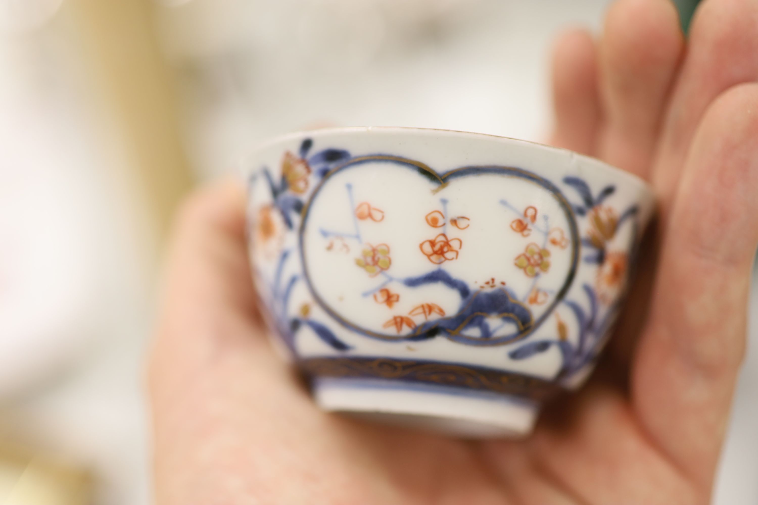 Three 18th century Chinese famille rose or Imari tea bowls together with five saucers